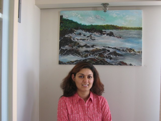 Surekha_with_her_painting_behind_her